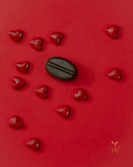 chocolate and candy on red background