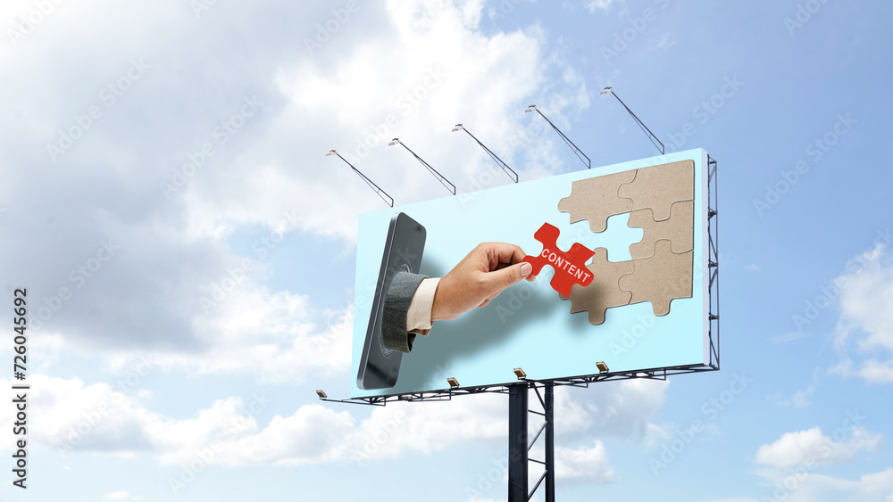 Poster billboard view of a business hand coming out from a mobile phone screen and showing content text on 