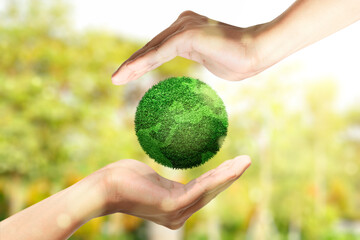 Human hand showing fertile land