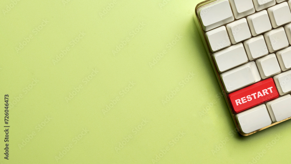Poster keyboard button with restart text