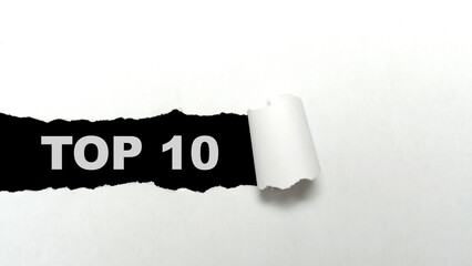 Ripped paper with the text of the top 10