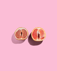Two Grapefruits on an Orange Background, Vagina Old Age Concept, Health, Vaginal Care Concept