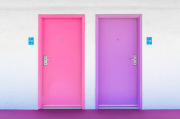 Pink and purple hotel room doors
