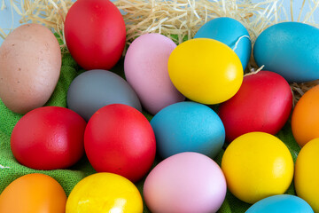 eggs painted in different colors to celebrate Easte