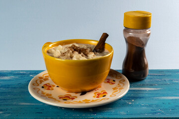 cup of canjica, typical food consumed in the Brazilian Festa Juninas