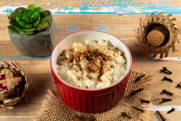 cup of canjica, typical food consumed in the Brazilian Festa Juninas
