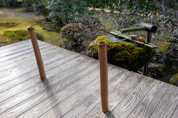 Suikinkutsu (buried earthen jar that makes sound when water drips into it) in Hosen-in temple in...