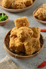 Tahu goreng cripsy, or crispy fried tofu, is one type of snack in Indonesia. Crispy tofu is mixed with small chilies and sauce