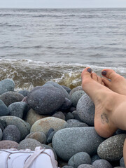 child on the rock beach