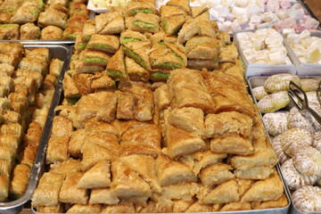 Bread and bakery products lie on display in a store.