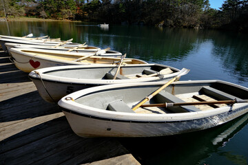Fototapeta na wymiar Wooden boat in the Japan lake.