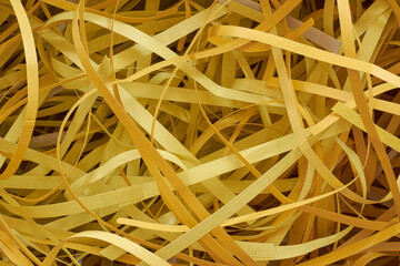 abstract of used discarded packaging straps, aka strapping, banding or bundling, yellow polyester...