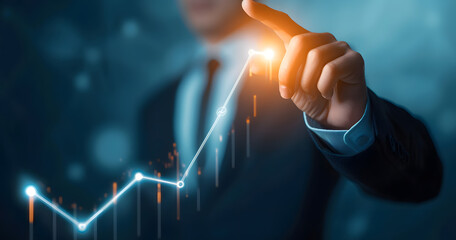 A businessman pointing to an arrow graph symbolizing corporate future growth plans. The concept of business development leading to success and continuous growth.