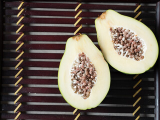 Papaya cut in half, tropical fruit	