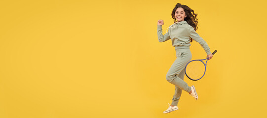 happy energetic kid jump in sportswear with squash racquet running to success, stamina. Horizontal poster of isolated child face, banner header, copy space.