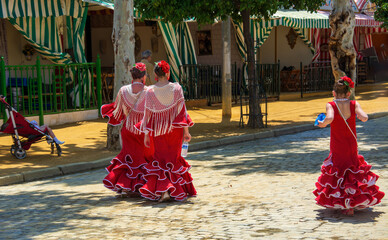 women and girls with a red flamenco dress