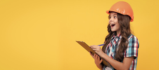 Renovation child, surprised teen girl in construction helmet making notes in clipboard, check...