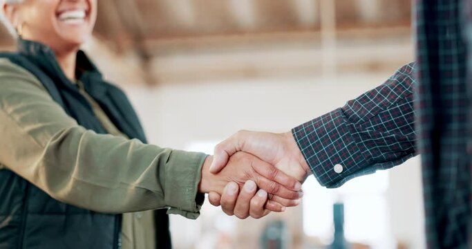 Engineering, teamwork or carpenter shaking hands in workshop for a manufacturing deal. Woodwork collaboration, construction or closeup of happy industrial workers in warehouse in a building agreement