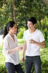 Young Chinese couple relaxing together.