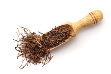 Top view of Organic Amar Bel (Cuscuta reflexa) roots, in a wooden scoop. Isolated on a white...