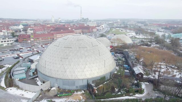 Aerial Shot Of Tropical Dome Zoo Infrastructure Surrounded By Urban Landscape in Randers, Denmark