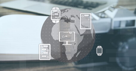 Image of communication icons and globe over laptop, notebook and camera