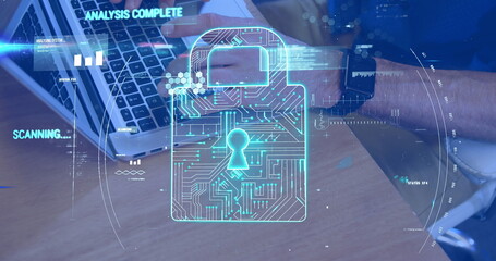 Image of padlock and data processing over caucasian businessman using laptop