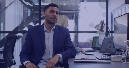 Image of network of connections with icons over diverse business people in office