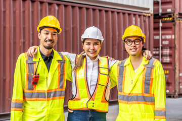 Portrait of group male and female container worker or dock foreman looking at camera and smiling together standing at warehouse logistic in Cargo freight ship for import export, friendship concept