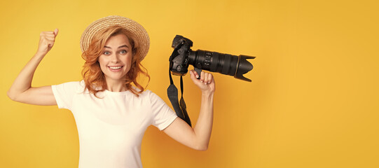 Woman isolated face portrait, banner with mock up copy space. glad woman in straw hat photographing. girl hold photo camera.