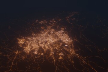 Aerial shot on Islamabad (Pakistan) at night, view from east. Imitation of satellite view on modern city with street lights and glow effect. 3d render