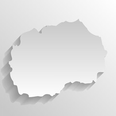 North Macedonia country silhouette. High detailed map. White country silhouette with dropped long shadow on beige background.