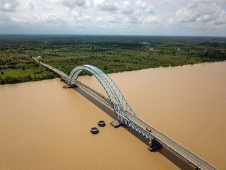 The bridge spans the Batanghari River, Jambi
