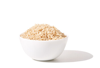 A bowl of uncooked brown rice, isolated against a white background. Healthy, savory dish includes whole grains like jasmine and basmati, showcasing a dieting Asian cuisine.
