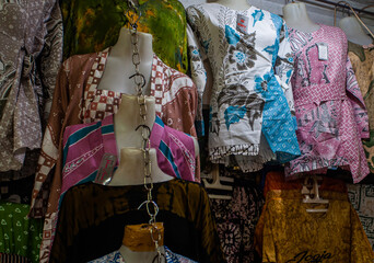 Traders sell various batik clothes with various motifs at Beringharjo Market, Jogjakarta,...