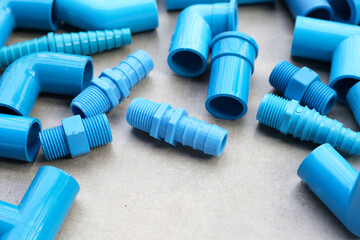 Blue pvc pipe connections for plumbing work. - obrazy, fototapety, plakaty
