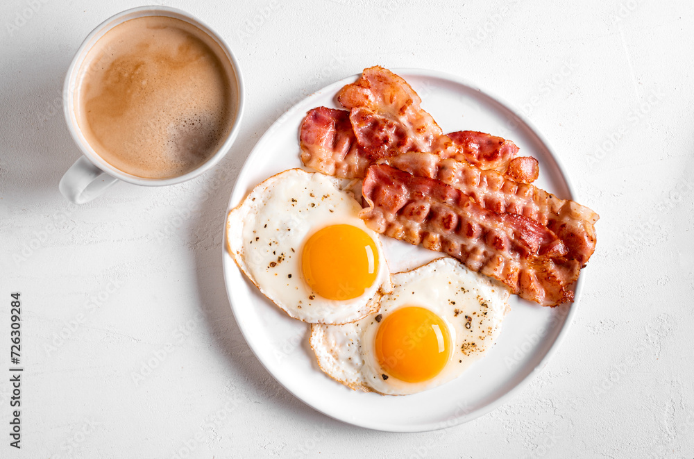 Wall mural breakfast with fried eggs, bacon and coffee