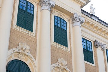 Beautiful architecture of Vienna. Schönbrunn Palace in Austria. Yellow facade with green elements....