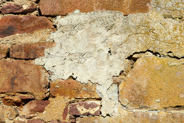 stone and cement wall deteriorated by the passage of time
