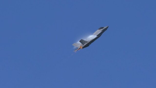 Supersonic F35 Fighter Jet High Speed Pass with Vapor Cone to Vertical Climb TRACK