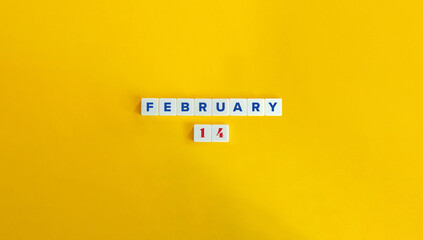 February 14. Block Letter Tiles on Yellow Background. Minimal Aesthetics. - obrazy, fototapety, plakaty