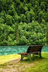 Fototapeta premium Bench at the Koenigssee, Berchtesgardener Land, Bavaria, Germany, Europe.