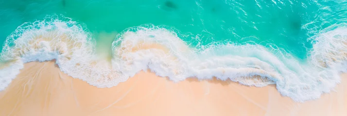 Tuinposter Aerial view of beach waves on a tropical sandy shore. Concept of summer holiday and exotic travel.  © henjon
