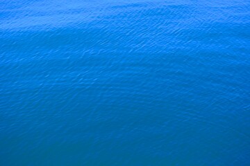 Blue calm water surface