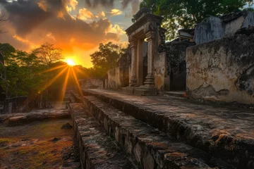 Foto op Canvas An ancient ruins site at sunset, offering a window into the past and the mysteries of historical civilizations. © furyon