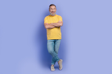 Full body portrait of creative minded aged man folded arms look empty space brainstorming isolated on purple color background