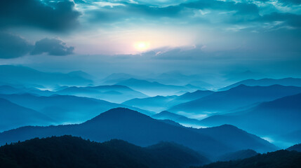 Obraz premium A View of a Mountain Range With the Sun in the Distance