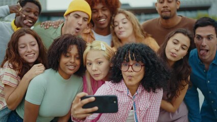 Multiethnic group of teenagers hanging out in the city center. Concepts about campus university students, friendship, and generation z