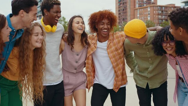 Multiethnic group of teenagers hanging out in the city center. Concepts about campus university students, friendship, and generation z