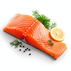 Fresh raw salmon fish fillet, herbs and lemon on isolated background
